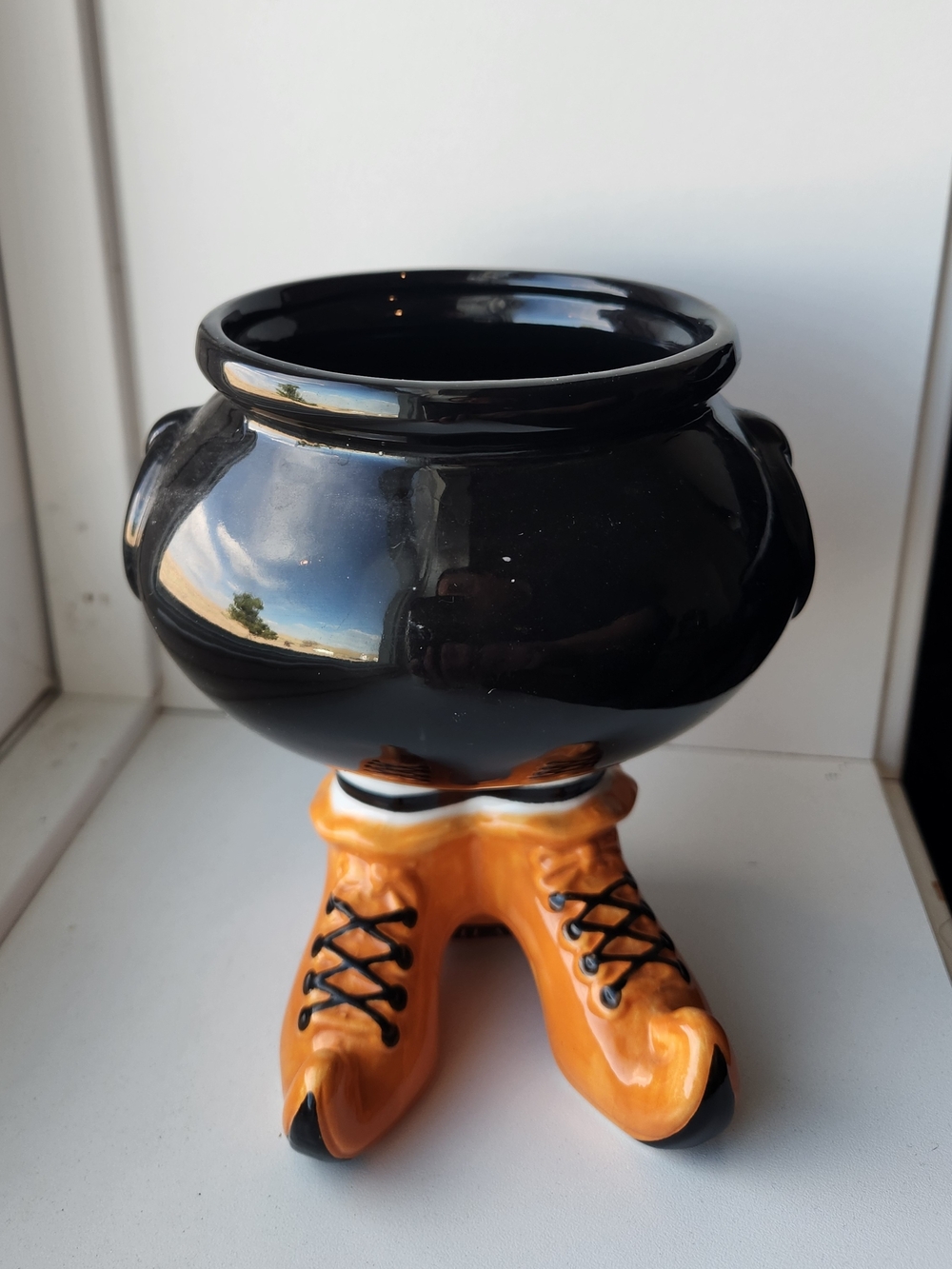 Ceramic Black Cauldron Bowl with Orange Shoe Base